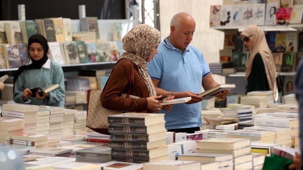 People attend the 13th Palestine International book fair, in the west bank city of Ramallah (07/09/23)