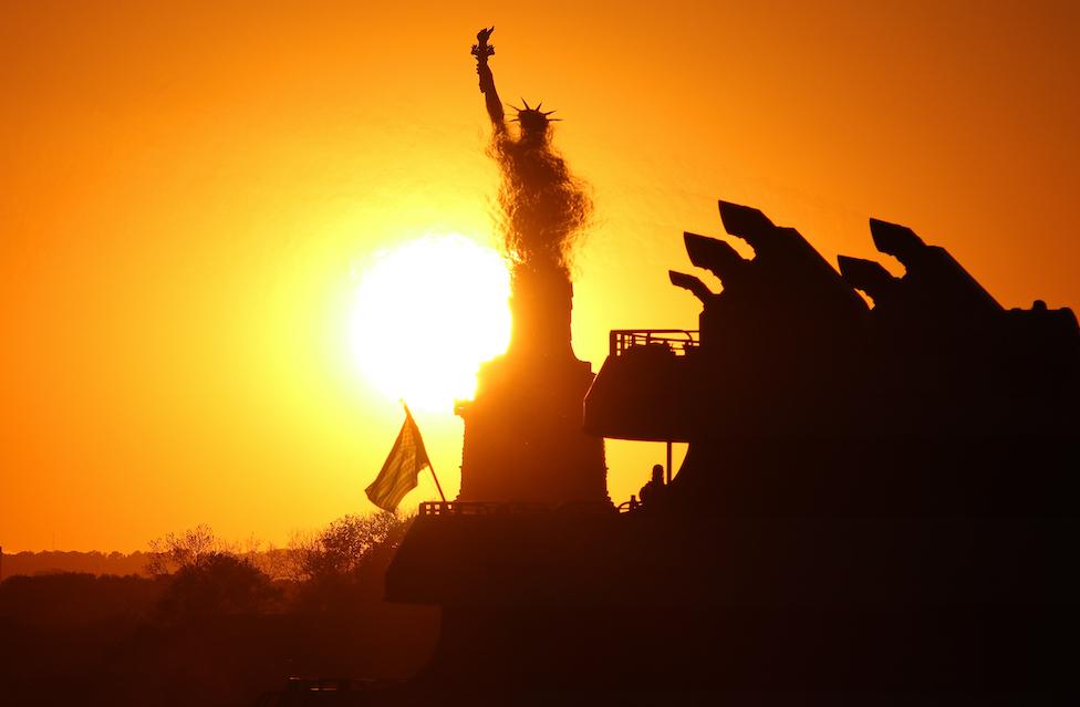 Statue of Liberty clouded by exhaust fumes