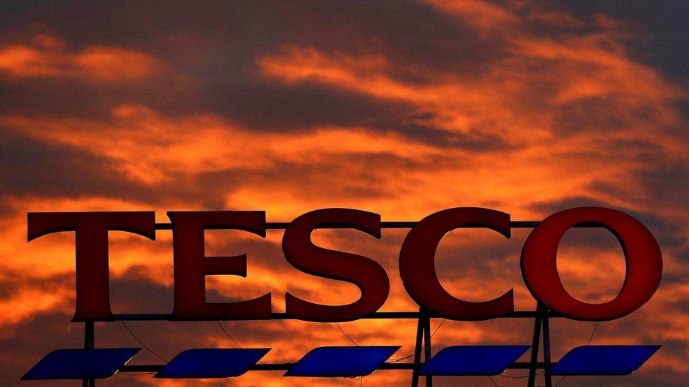 Red clouds over Tesco store