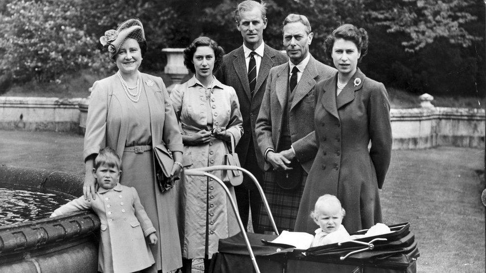 (left to right) Queen Elizabeth, Princess Margaret Rose (1930 - 2002), Prince Philip, Duke of Edinburgh, King George VI (1895 - 1952), and Princess Elizabeth with her children Prince Charles (left) and Princess Anne.