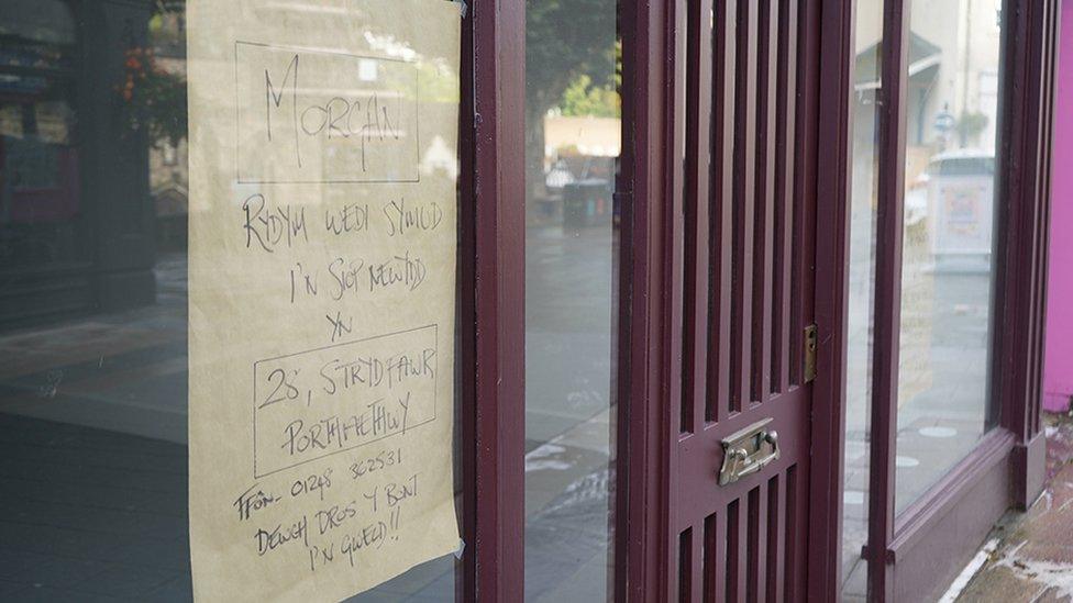 Morgan shop front, with a 'closed' sign