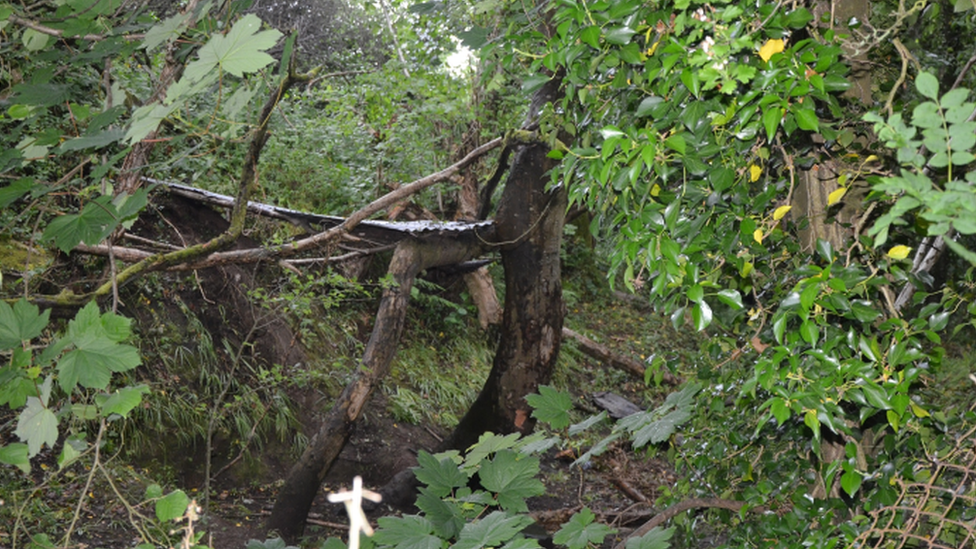 A children's den near to where the weaponry was found