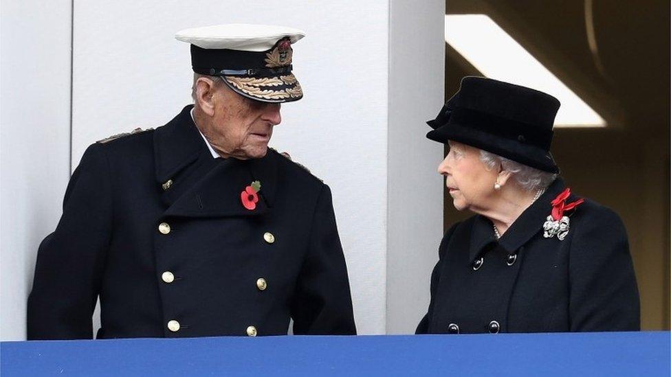 The Queen and the Duke of Edinburgh on the balcony of the Foreign Office