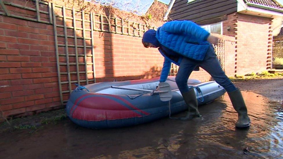 Elliot Askey with dinghy