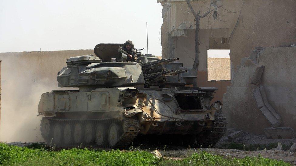 Syrian pro-government forces in the Eastern Ghouta town of Aftris, outside Damascus (10 March 2018)