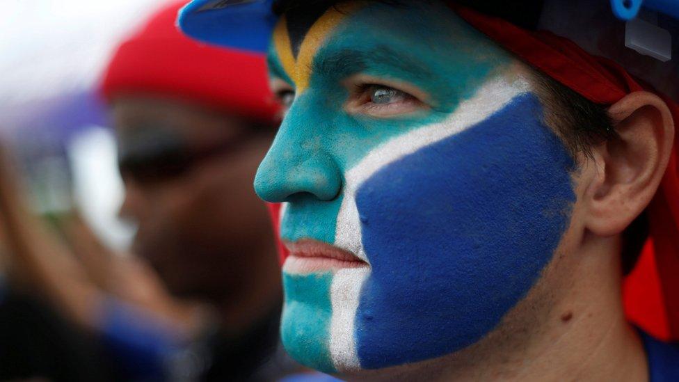 A protester during a march in Durban calling for the removal of South African President Jacob Zuma, 7 April 2017