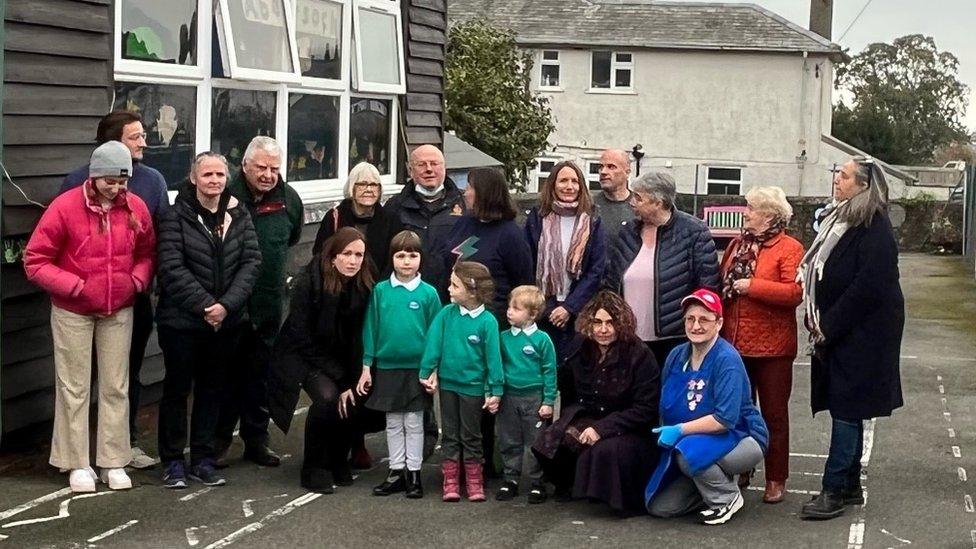 Staff and pupils outside Ysgol Abersoch