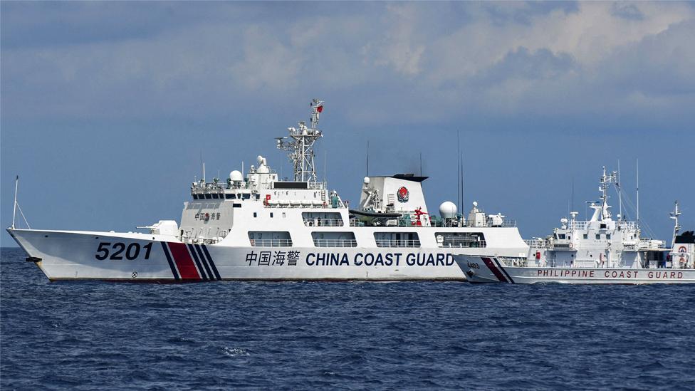 China coast guard ship blocks Philippine coast guard boat in the South China Sea