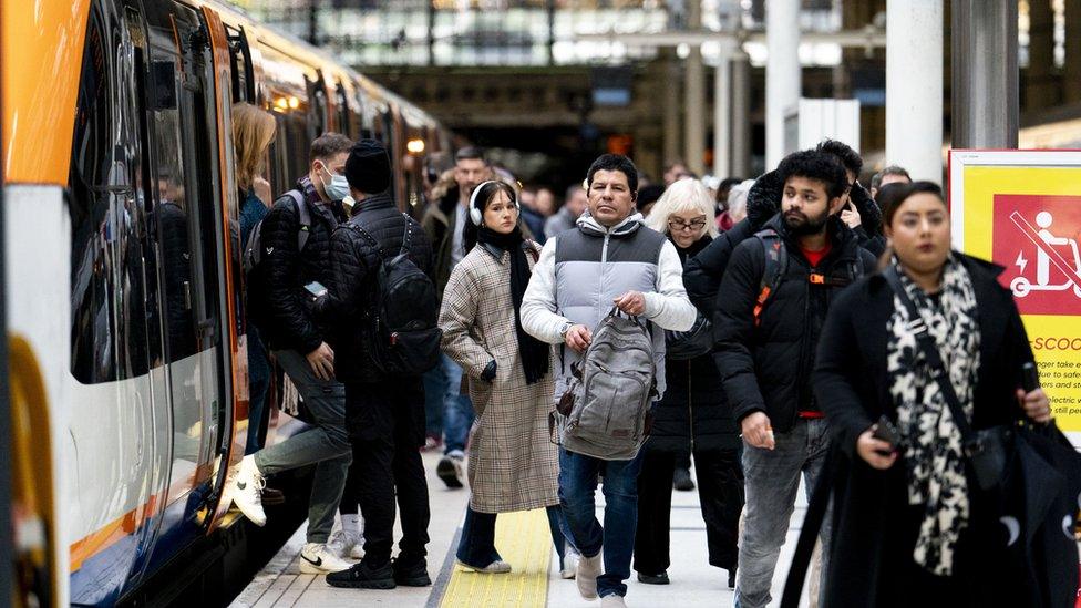 Passengers at Liverpool Street station