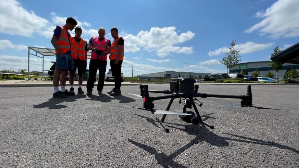 Students with a drone