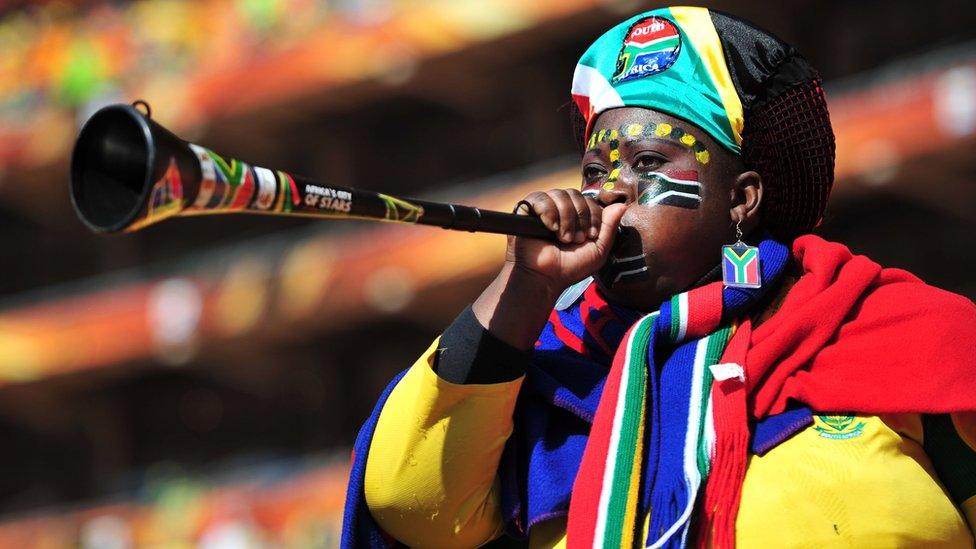 A South Africa supporter blows a Vuvuzela at the 2010 FIFA World Cup in South Africa on 11 June, 2010