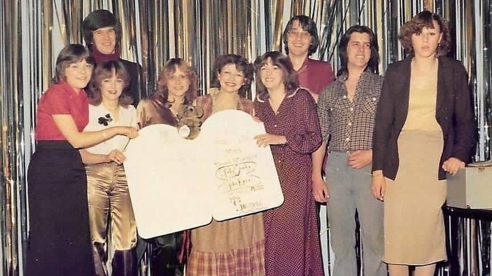 David Clayton and a group of people on stage at Ocean Room in late 1970s or early 1980s