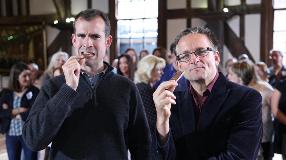 Chris Van Tulleken and Michael Mosley eat chocolate