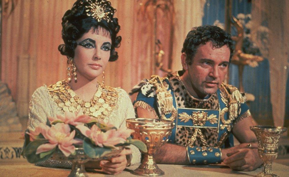 British actress Elizabeth Taylor and Welsh actor Richard Burton on the set of the film Cleopatra directed by American Joseph L. Mankiewicz