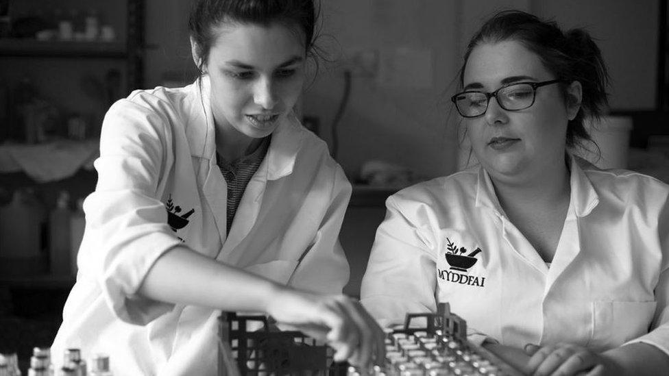 Two of the workers at Myddfai, which is swapping plastic bottles for glass