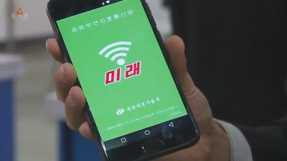 An Arirang 171 smartphone being used to access "Mirae" during a science fair