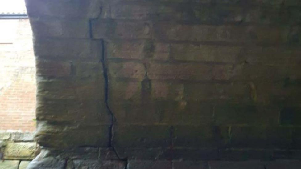 The crack going down the north-east corner of the bridge 