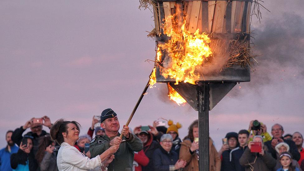 This is the Station Commander from RAF Lossiemouth getting ready to the light the Beacon on East Beach and a couple of other shots.