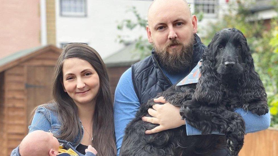 Zoe Bartley with her partner, baby and dog