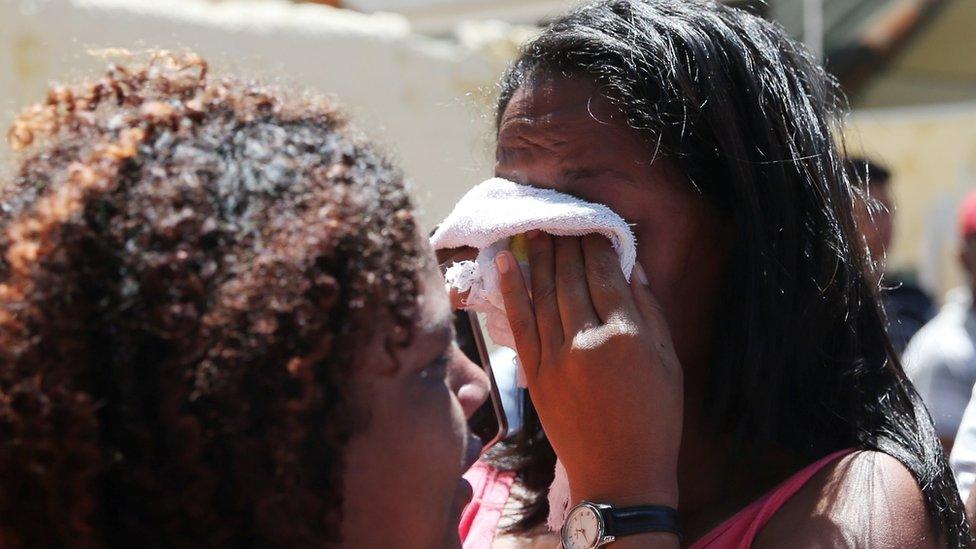 relatives outside school in suzano after shooting