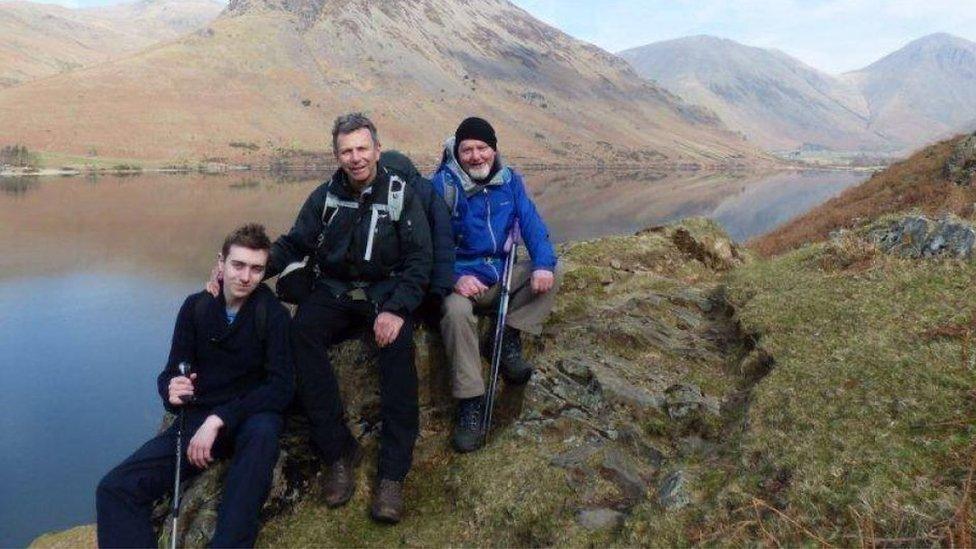 Paul pictured with his son and friend