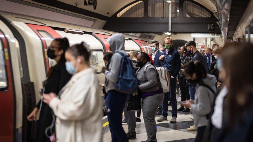 Travellers on the Tube in London