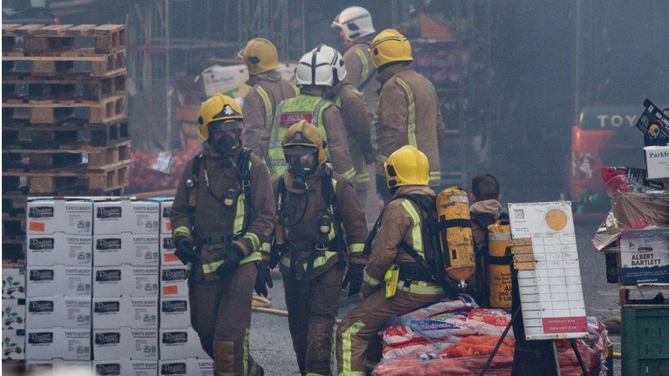 Firefighters at market