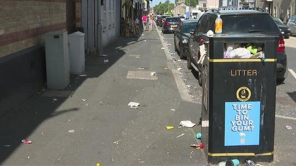 Bin overflowing with litter