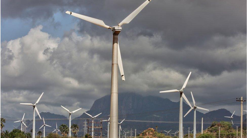 Wind turbines generate electricity in Punniyavalanpuram, Tamil Nadu, India.