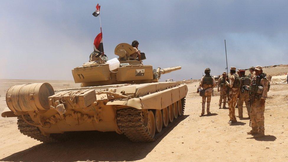 Iraqi soldiers gather to go battle against Islamic State militants south of Mosul, Iraq on 15 June