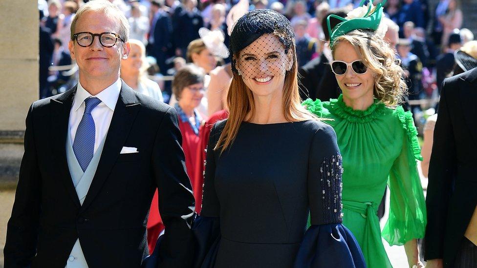 Sarah Rafferty in an embellished navy dress and hat