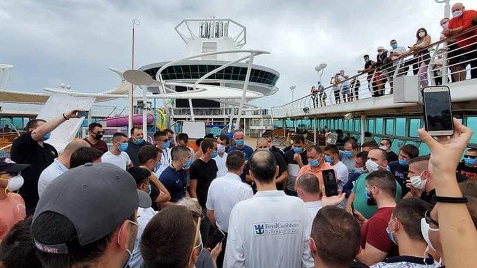 Protesters gather on the Majesty of the Seas cruise ship