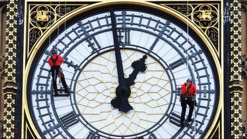 Men abseil down St Stephen's Tower, which houses Big Ben