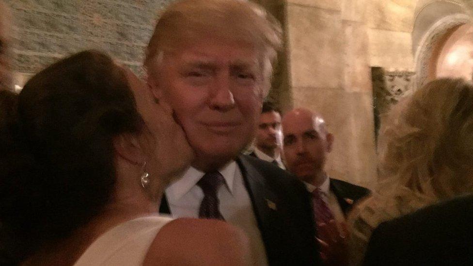 Trump being kissed by a bride