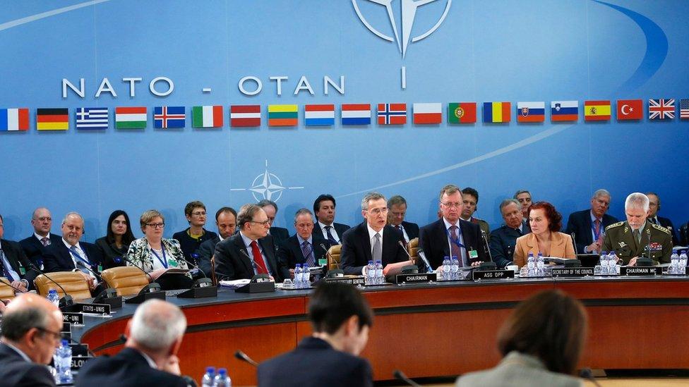 NATO Secretary General Jens Stoltenberg (C) addresses a NATO defence ministers meeting at the alliance's headquarters in Brussels on 10 February 2016