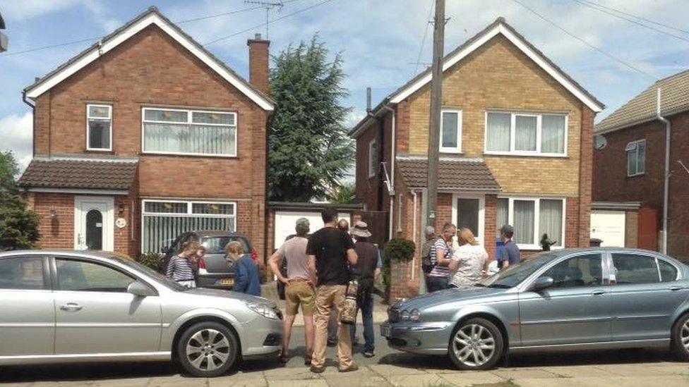 Bird watchers on Larchcroft Close