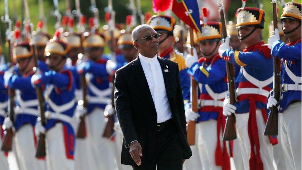 David Granger reviews an honour guard during the Mercosur trade bloc"s annual summit in Brasilia, Brazil December, 21, 2017