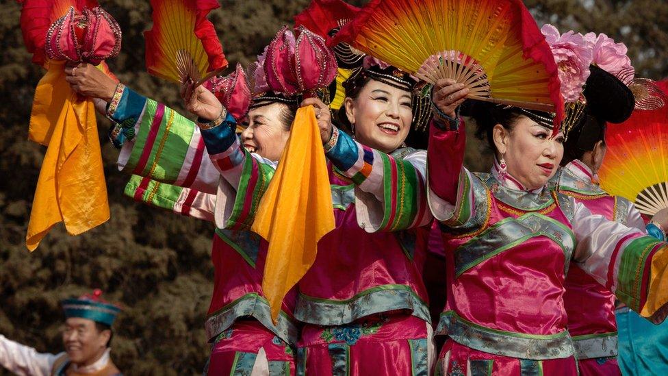 Performers dancing on stage