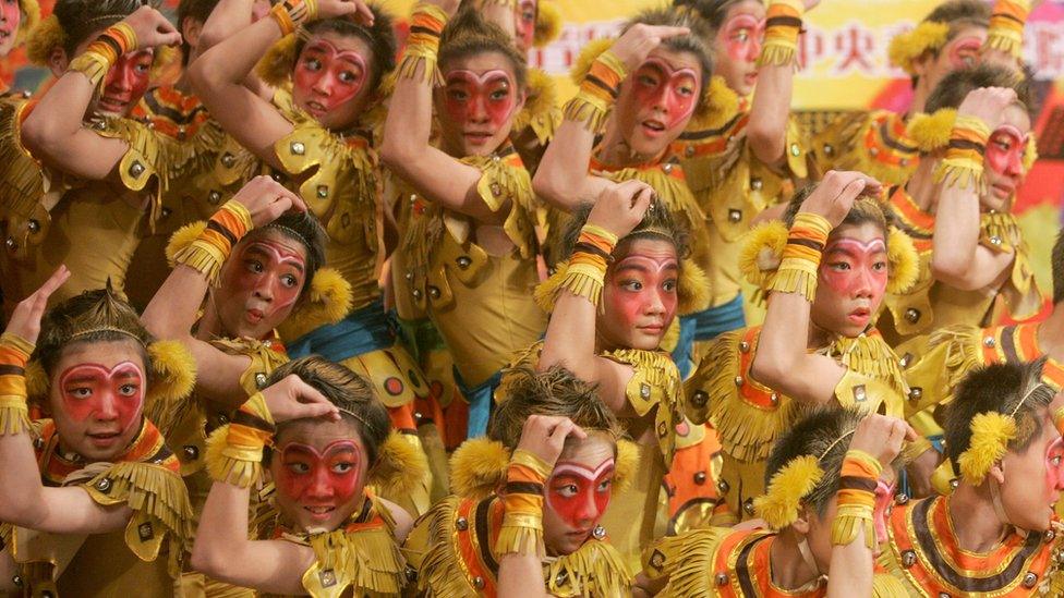 Opera school students during a performance about Monkey God