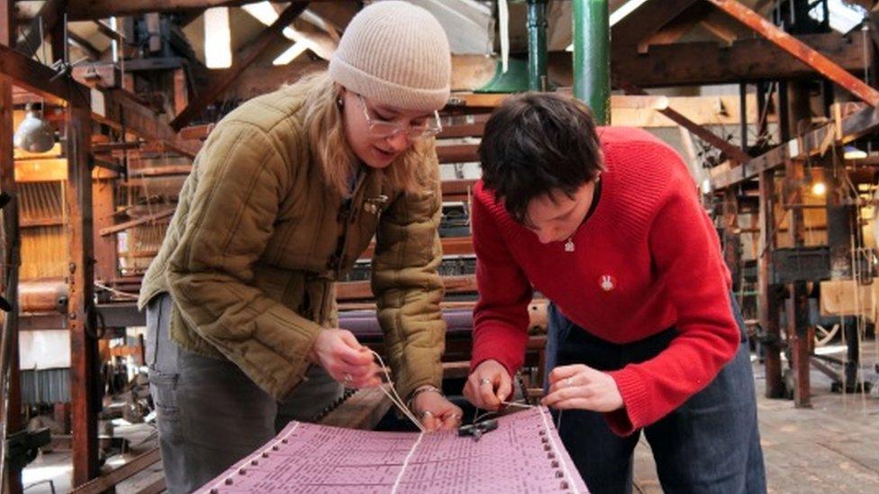 Ruth Farris and Bea Uprichard threading the new jacquard cards