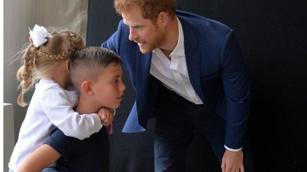 Prince Harry with children