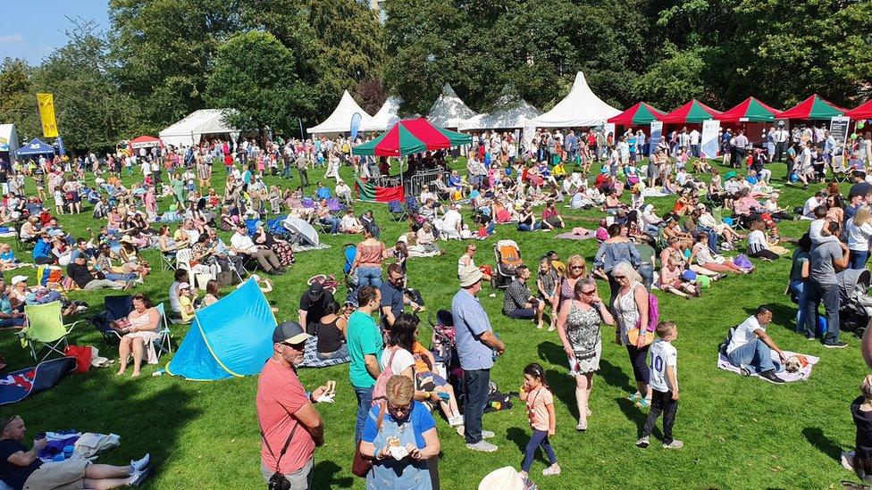 People enjoying Belfast Mela