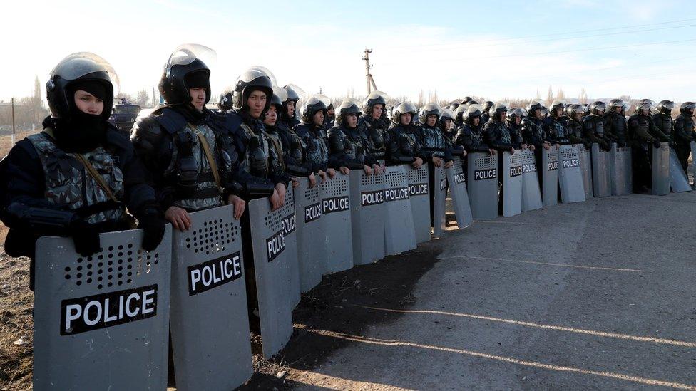 Kazakh riot police near the village of Masanchi