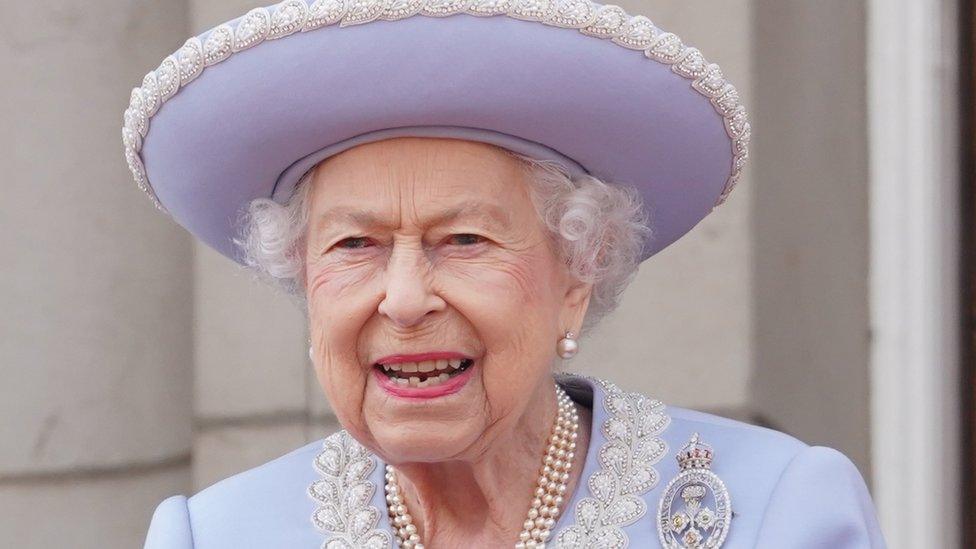 Queen Elizabeth II watching the Royal Procession from the balcony at Buckingham Palace following the Trooping the Colour ceremony in central London, as the Queen celebrates her official birthday, on day one of the Platinum Jubilee celebrations.