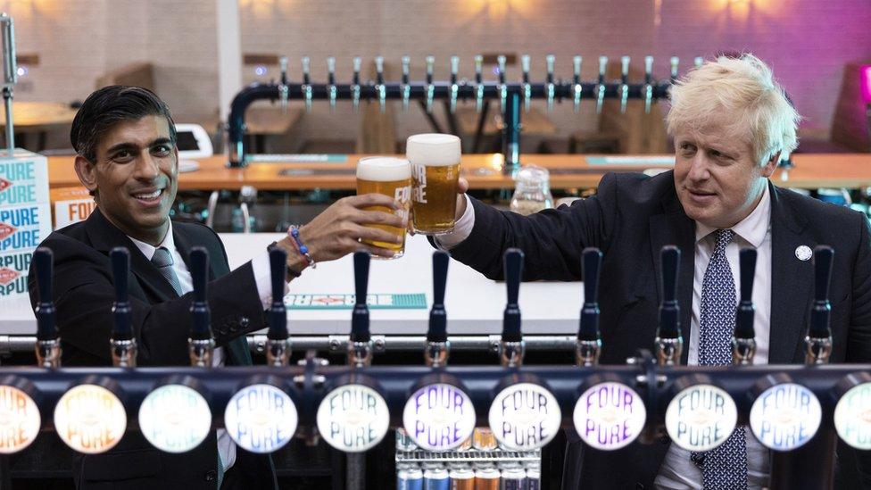 Boris Johnson and Rishi Sunak seen during a visit to a brewery in Bermondsey, London