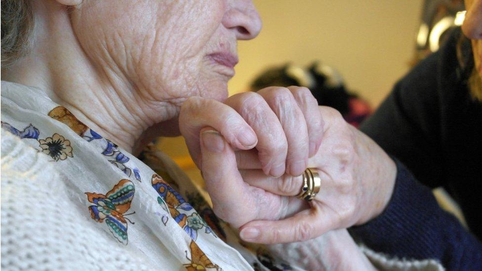 Carer with elderly woman