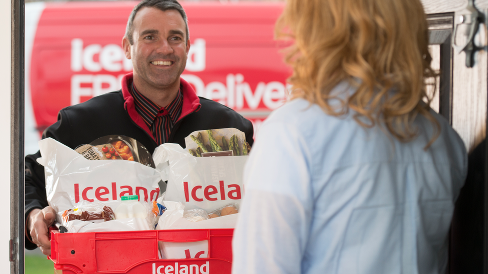 Iceland delivery driver with goods