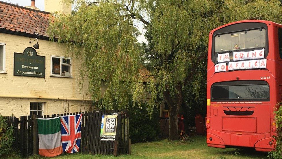 Red double decker bus at The Crown