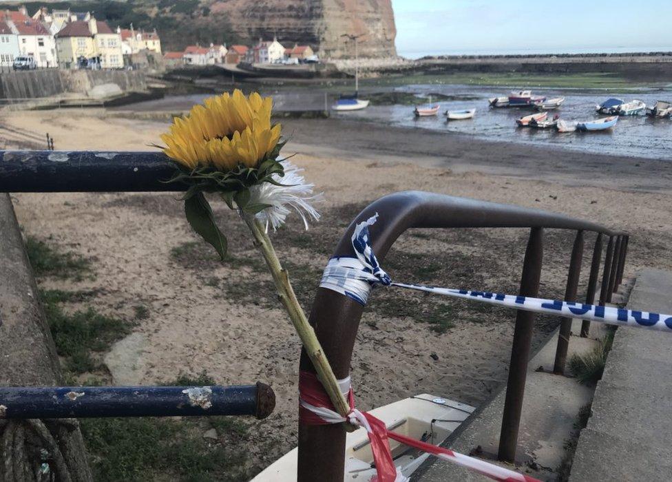 Flower left at police cordon in Staithes