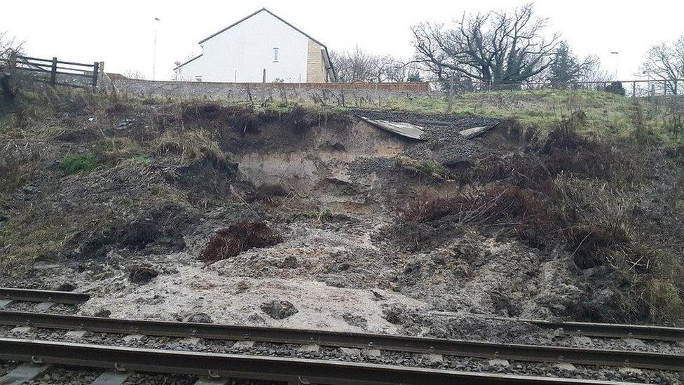 Engineers work to clear rubble from the landslide near Hexham